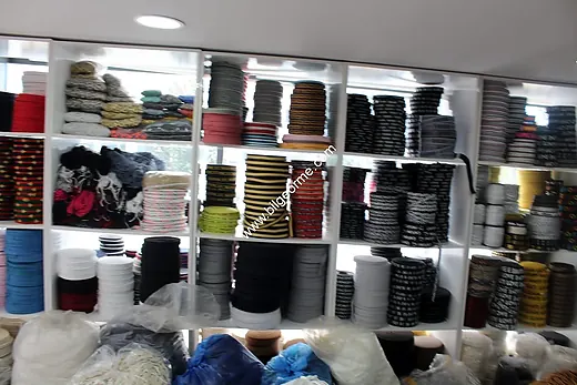 Narrow woven product 66